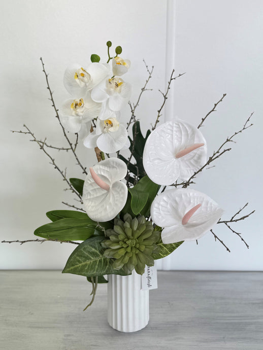 Faux white arrangement